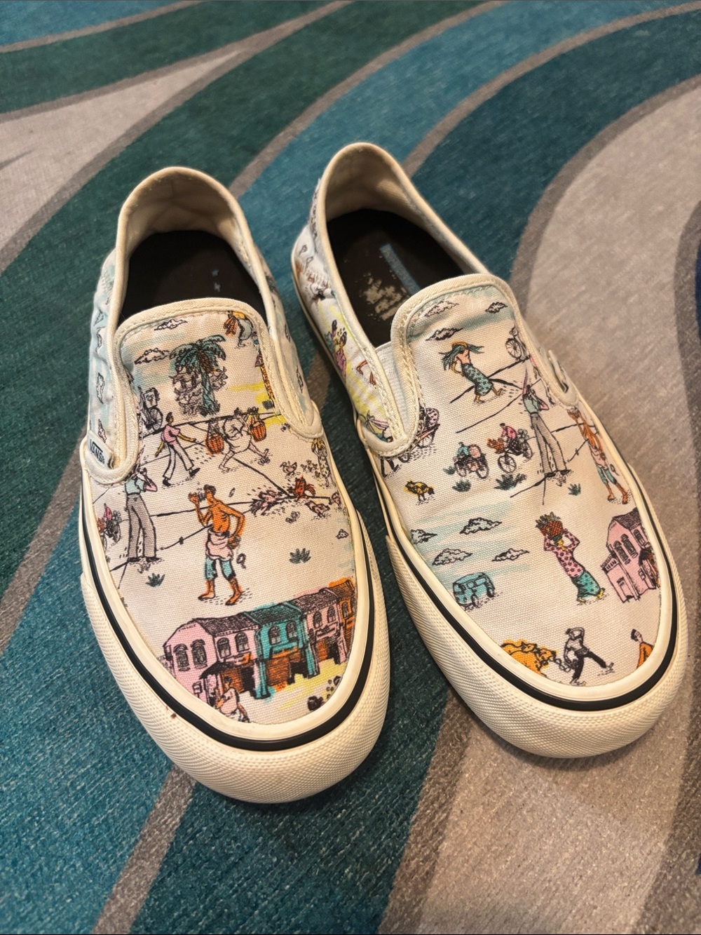 Vans Women’s Slip-On Sneakers in White with Multicolor Illustration